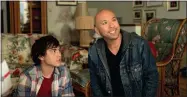  ?? COURTESY OF UNIVERSAL PICTURES ?? Brandon Wardell, left, and Jo Koy appear in a scene from “Easter Sunday.”