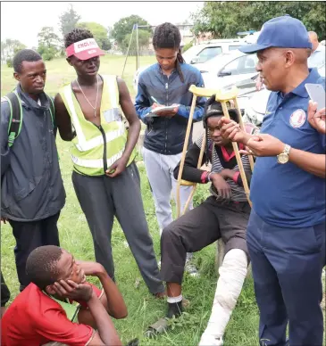  ??  ?? The destitute listening intently to the Mayor addressing them