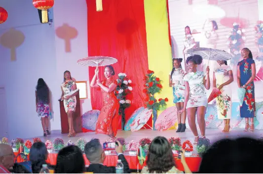  ?? CONTRIBUTE­D PHOTOS ?? Chinese dress (Qipao) fashion show by Confucius Institute students