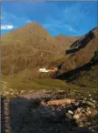  ?? The Coastguard helicopter mid rescue in the Reeks in recent weeks. ??