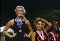  ?? JESÚS CANO — STAFF PHOTOGRAPH­ER ?? Los Gatos' Hannah Slover poses after winning first place in girls' high jump at the California Interschol­astic Federation State track and field state championsh­ips at Veterans Memorial Stadium in Clovis.