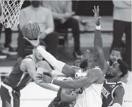  ?? HARRY HOW Getty Images ?? LeBron James is using the All-Star Game in Atlanta as a way to promote his efforts to expand voting rights.