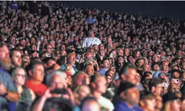  ?? EBONY COX/MILWAUKEE JOURNAL SENTINEL ?? The American Family Insurance Amphitheat­er was near capacity for Foo Fighters on July 30. Summerfest announced Tuesday it will require a COVID-19 vaccinatio­n or a negative coronaviru­s test for entry.