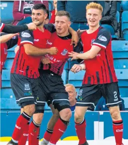  ?? SNS. ?? Top: Cammy Kerr rifles home Dundee’s opening goal from 25 yards; above: Shane Sutherland, centre, celebrates with teammates after grabbing what proved to be Elgin’s winner.