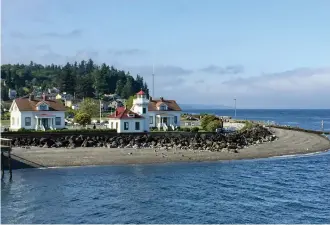  ??  ?? Located on Puget Sound, the Mukilteo Light Station was built in 1906 and is one of the few wooden lighthouse­s in the Pacific Northwest.