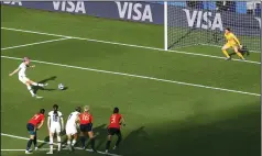  ?? RICHARD SELLERS/EMPICS SPORT/PA PHOTOS/ABACA PRESS/TNS ?? USA's Megan Rapinoe scores her side's second goal of the game from the penalty spot against Spain on Monday.