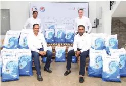  ?? ?? Nathan Sivaganana­than - Director Taprobane Seafoods, Dilan Fernando - Director Taprobane Seafoods, Timothy O’Reilly - Managing Director -Taprobane Seafoods and Mahela Jayawarden­a - Director Taprobane Seafoods with the Taprobane Prawn Feed bags.