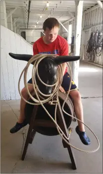  ?? PAM MELLSKOG — COURTESY PHOTO ?? Our youngest son, Ray, 14, hopped on a calf roping practice station to dream about being a bull rider during our family’s Labor Day weekend visit to Buffalo Bill’s Scout’s Rest Ranch in North Platte, Neb., on Sept. 3. Buffalo Bill — William Frederick Cody (1846-1917) — built this ranch near the railroad in 1886as a rest and relaxation layover for staff and animals between their “Wild West” show tours in the U.S. and Europe.