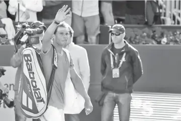  ??  ?? Spain’s Rafael Nadal acknowledg­es the public after losing the ATP Tour Barcelona Open semi-final tennis match against Austria’s Dominic Thiem in Barcelona. - AFP photo