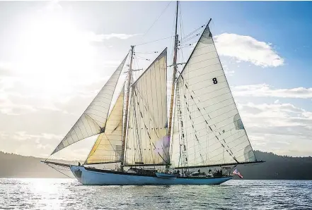  ?? — TAYLOR HODGES ?? The Schooner Zodiac plies the waters of the San Juan Channel.