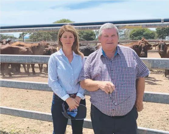  ??  ?? SPREADING WORD: North Queensland Livestock Industry Recovery Agency head Shane Stone with advisory board member Tracey Hayes in Townsville.