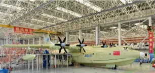  ?? AP ?? amphibious aircraft aG600 rolls off a production line in Zhuhai, China’s Guangdong province. —