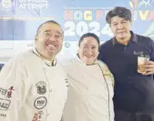  ?? ?? Spotted: Chef Mike Santos of the Vikings group and chef Ivan Mamita of Brotzeit, with author Karla Reyes, ready to feed their pork specialtie­s.