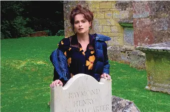  ?? COURTESY OF WILD PICTURES ?? Actress Helena Bonham Carter in Stockton, Wiltshire beside the grave of her father.
