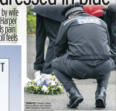  ??  ?? TRIBUTE Thames Valley Police officer with flowers after Newbury memorial