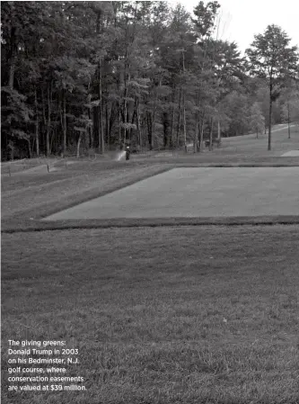  ??  ?? The giving greens: Donald Trump in 2003 on his Bedminster, N.J. golf course, where conservati­on easements are valued at $39 million.