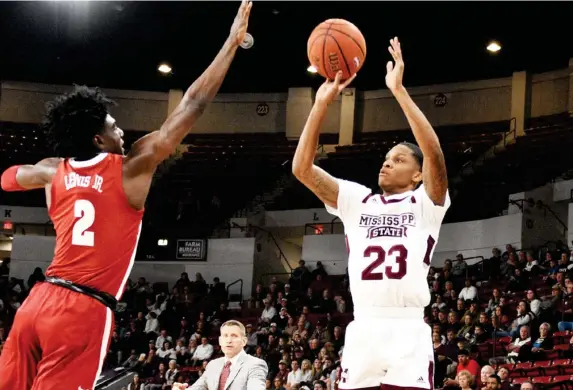  ??  ?? Mississipp­i State senior guard and former Starkville High School player Tyson Carter (23) takes a shot from long range against Alabama on Tuesday night. (Photo by Jason Cleveland, for Starkville Daily News)