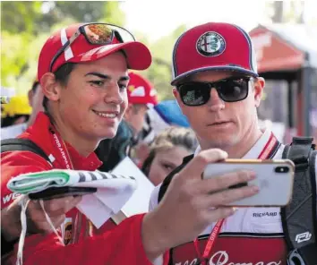  ?? AFP ?? Kimi ist Kult: Der stoische Finne ist der beliebtest­e Fahrer bei den Formel-1-Fans.