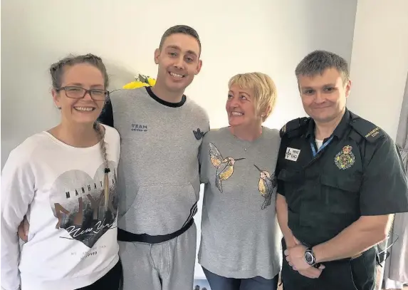  ??  ?? > From left: Ceri Ann Cleverly, Rhys Parker, Rhys’ mum Susan and Welsh Ambulance Service paramedic Mark Sutherland