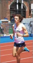  ?? MICHAEL REEVES — FOR DIGITAL FIRST MEDIA ?? Villanova’s Logan Wetzel picks up speed during the Wildcats men’s 4 x mile victory Saturday at the Penn Relays.