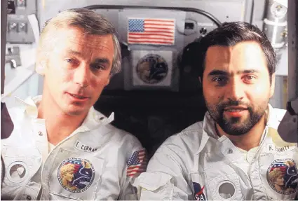  ?? SOURCE: NASA ?? Mission commander Eugene Cernan, left, and scientist-astronaut Harrison Schmitt were photograph­ed by command module pilot Ron Evans, the third crew member.