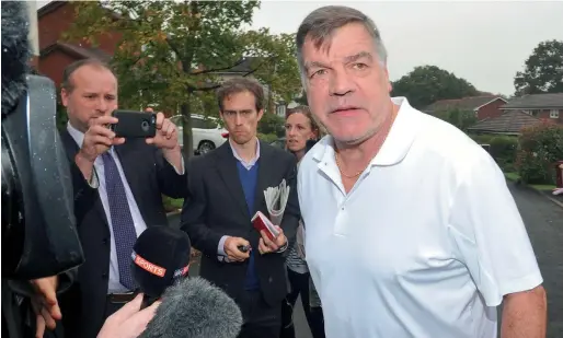  ?? Reuters ?? Sam Allardyce speaks to media as he leaves his home in Bolton. —