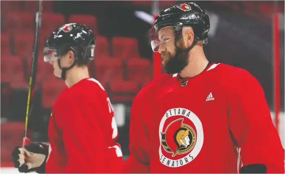  ?? MATT TIDCOMBE ?? Veteran NHLer Derek Stepan, right, is new in Ottawa, but he's found time to impart some early wisdom about the league to rookie Tim Stuetzle.