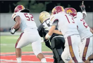  ?? ANDA CHU — STAFF PHOTOGRAPH­ER ?? Menlo-Atherton’s Noa Ngalu heads for the end zone and scores on a 65-yard return after stealing the handoff against Mitty. The Bears won 28-21.