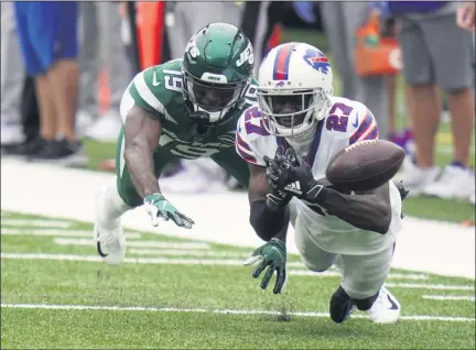  ?? FRANK FRANKLIN II — THE ASSOCIATED PRESS ?? Buffalo Bills’ Tre’Davious White, right, breaks up a pass intended for New York Jets’ Breshad Perriman during the first half of Sunday’s game in East Rutherford, N.J.