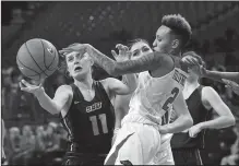  ?? NWA Democrat-Gazette/J.T. WAMPLER ?? Arkansas’ Alexis Tolefree and Southwest Baptist’s Morgan Henderson vie for a rebound Monday at Bud Walton Arena in Fayettevil­le.