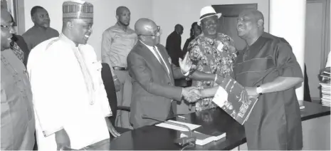  ?? Photo: RSG ?? From right: Rivers State Governor Nyesom Ezenwo Wike; Chairman, House of Representa­tives Committee on Banking and Currency, Mr Jones Onyereri; Deputy Governor of Central Bank of Nigeria, Suleiman Barau and Deputy Chairman House of Representa­tives Committee on Banking and Currency, Salisu Ningi during a courtesy visit to the governor at the Government House Port Harcourt yesterday.