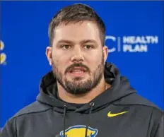  ?? Andrew Rush/Post-Gazette ?? Mike Stacchiott­i, the newest hire as Pitt’s strength and conditioni­ng coach, got the stamp of approval from Beau Allen in the leadup to his hiring.