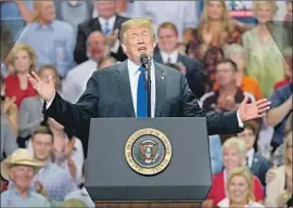  ?? Brandon Dill EPA/Shuttersto­ck ?? PRESIDENT TRUMP drew laughter and applause at a rally in Southaven, Miss., when he mocked Christine Blasey Ford’s testimony against Brett Kavanaugh.