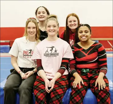  ?? PILOT PHOTO/RUDY MARQUEZ ?? Plymouth gymnastics seniors are, front, from left: Emma Erhart (manager), Tessa Hutchinson, and Kasi Harner and back: Kylee Gaines (manager) and Emma Rozycki (manager).