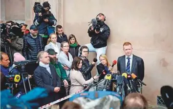 ?? AFP ?? Prosecutor Jakob Buch-Jepsen (centre) speaks with journalist­s at a press briefing in front of the courthouse in Copenhagen after the verdict in the case of Peter Madsen was delivered yesterday.
