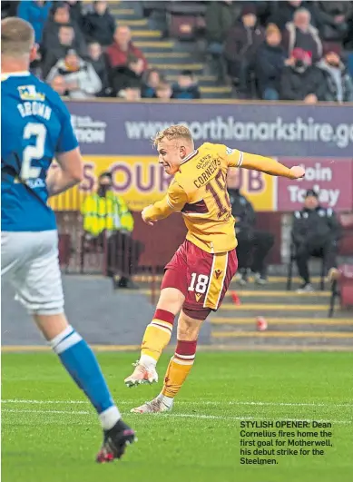  ?? ?? STYLISH OPENER: Dean Cornelius fires home the first goal for Motherwell, his debut strike for the Steelmen.