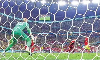  ?? AGENCIES ?? Brazil’s Richarliso­n scores a stunning bicycle kick against Serbia in their World Cup opener.