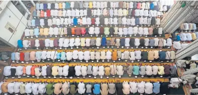  ?? Picture: Associated Press. ?? Indian Muslims offer Friday prayers during the holy Islamic month of Ramadan at a mosque in Allahabad, India.