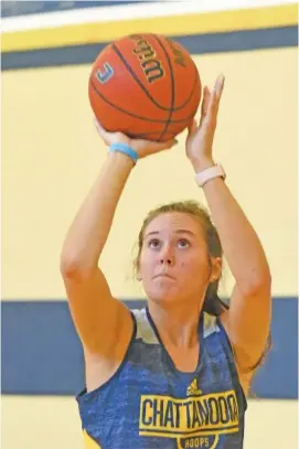  ?? STAFF PHOTO BY MATT HAMILTON ?? UTC freshman Anna Walker shoots during practice on Oct. 15. Walker, who helped lead Bradley Central to the TSSAA Class AAA state title in 2019 as a high school junior, is getting ready for her first season with the Mocs, who open Nov. 25 at Tennessee State.