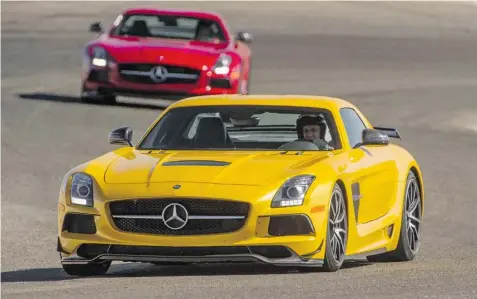  ?? Mercedes-Benz photos ?? The 2014 Mercedes-Benz SLS AMG Black Series may be the best front-engine, rear-wheel-drive sports car made.