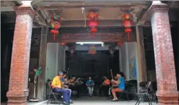  ?? PHOTOS PROVIDED TO CHINA DAILY ?? Above: Local people in Quanzhou city play nanyin music as a hobby in their leisure time. Top: South Shaolin Temple in Quanzhou. Further Top: The Yangbian Great Wall of the early Ming Dynasty.