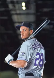  ?? MARK J. REBILAS, USA TODAY SPORTS ?? Rockies third baseman Nolan Arenado reached career highs in home runs and RBI before the All-Star break.