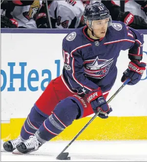  ?? AP PHOTO ?? In this Nov. 24, 2017, file photo, Columbus Blue Jackets forward Cam Atkinson moves the puck against the Ottawa Senators during an NHL game in Columbus, Ohio.