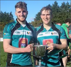  ??  ?? Ross Donohoe and Kevin Sheridan of Maynooth University display the Kehoe Cup after their victory over Wicklow in Arklow on Sunday.