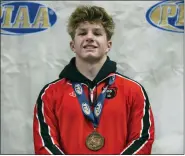  ?? AUSTIN HERTZOG - MEDIANEWS GROUP ?? Boyertown’s Gavin Sheridan poses with his medal on the podium at the PIAA Wrestling Championsh­ips on March 11 at Giant Center in Hershey.