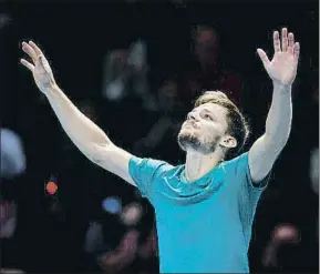  ?? TONY OBRIEN / REUTERS ?? David Goffin celebra su victoria contra pronóstico ante Roger Federer