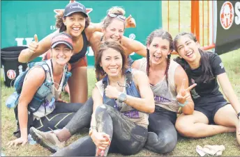  ??  ?? Some female participan­ts in high spirits after completing the race.