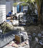  ?? REFUGEE ACTION COALITION / AP ?? A camp on Manus Island, Papua New Guinea, appears ransacked Thursday in this photo provided by an aid group. Refugees said shelters, beds and other belongings there were destroyed by authoritie­s.