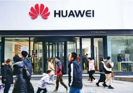  ??  ?? MISDIRECTE­D The U.S. has slapped tariffs on steel, at right, while China’s behavior in high-tech industries gets a pass. Left, from top: A Huawei store in Shenyang; Huawei devices on display at the Mobile World Congress 2017 in Barcelona, Spain.