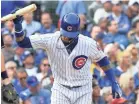  ?? PATRICK GORSKI/USA TODAY SPORTS ?? Cubs shortstop Javier Baez reacts after flying out in the 3-1 loss to the Brewers for the NL Central title Monday.